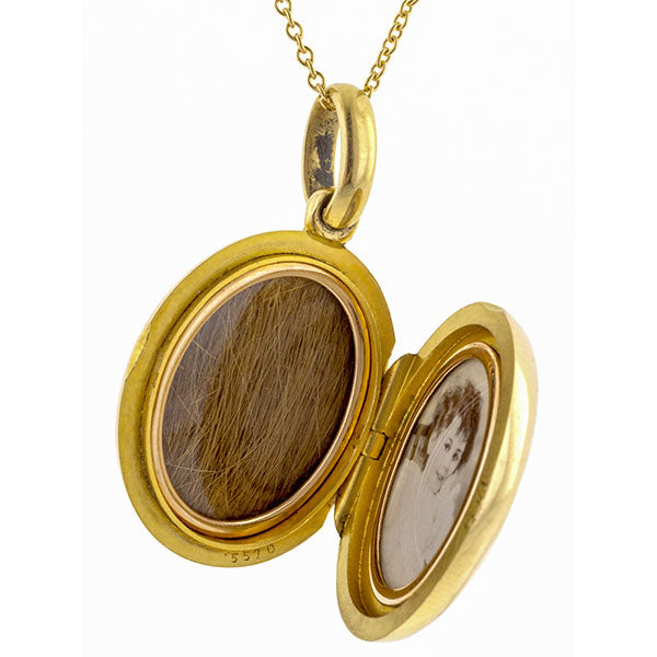 Victorian locket: 18k Yellow Gold Oval Locket Pendant Necklace With Original Girl Picture And Lock of Hair sold by Doyle & Doyle vintage and antique jewelry boutique.