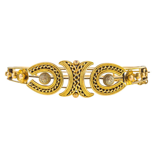 Victorian Bangle Bracelet, a Victorian bangle bracelet with horseshoe motif, in yellow gold, sold by Doyle & Doyle vintage and antique jewelry boutique.