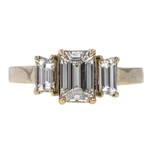 Vintage Three Stone Engagement Ring, Emerald cut 0.96ct., sold by Doyle & Doyle an antique and vintage jewelry store.