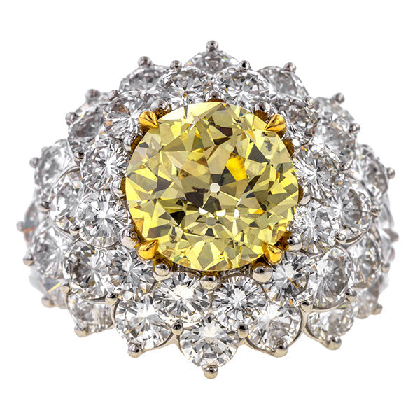 Vintage ring: a Platinum Yellow Diamond Cluster Ring, Old European cut 3.03ct. Cut Engagement Ring sold by Doyle & Doyle a vintage and antique jewelry boutique.