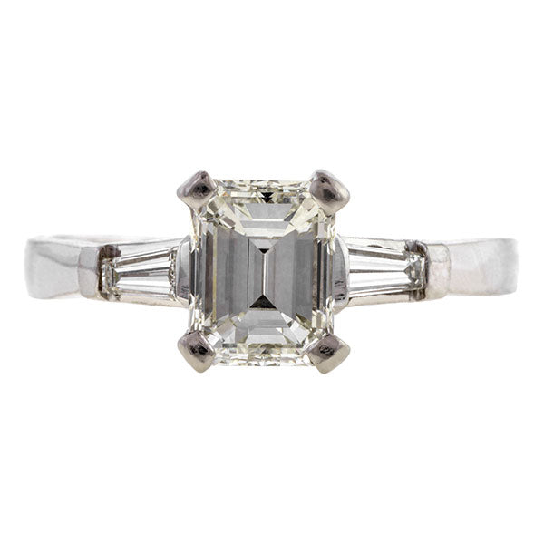 Estate ring: a Platinum Engagement Ring,  Emerald Cut, sold by Doyle & Doyle vintage and antique jewelry boutique.