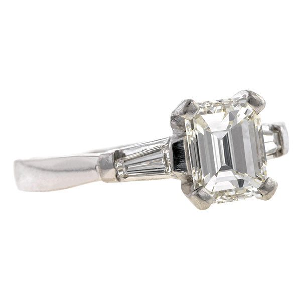 Estate ring: a Platinum Engagement Ring,  Emerald Cut, sold by Doyle & Doyle vintage and antique jewelry boutique.