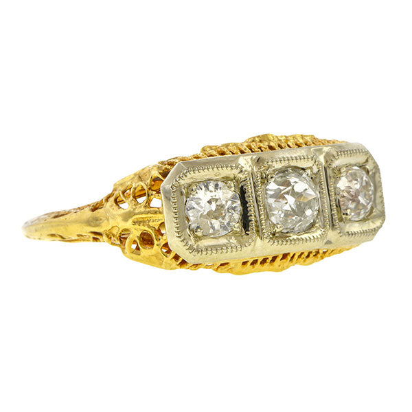 Vintage ring; a Yellow & White Gold Three Stone Diamond Filigree Old European Cut Engagement Ring sold by Doyle & Doyle vintage and antique jewelry boutique.