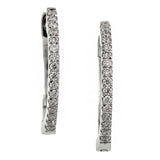 Contemporary earrings: a White Gold Round Brilliant Cut Hoop Earrings sold by Doyle & Doyle vintage and antique jewelry boutique.