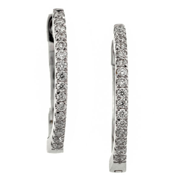 Contemporary earrings: a White Gold Round Brilliant Cut Hoop Earrings sold by Doyle & Doyle vintage and antique jewelry boutique.