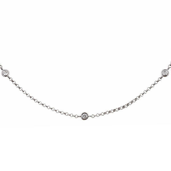 Contemporary necklace: a White Gold Bezel Set Round Brilliant Cut Diamond Chain sold by Doyle & Doyle vintage and antique jewelry boutique. 