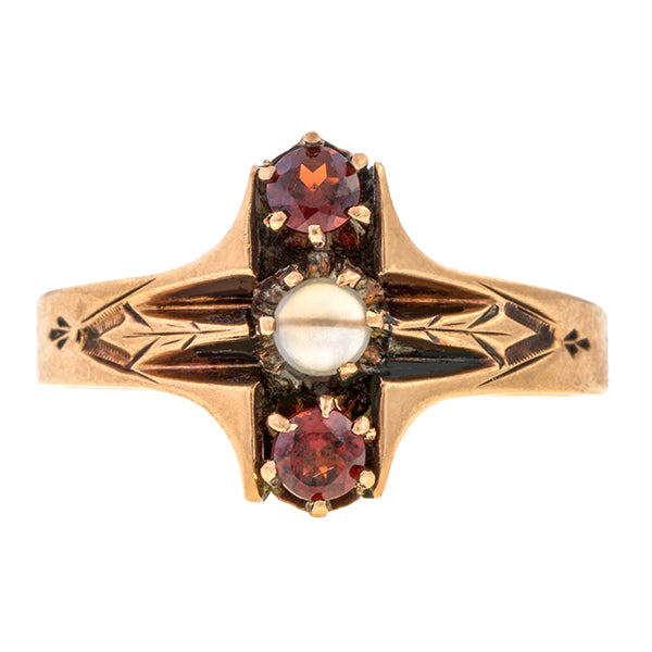 Victorian ring: a 10k Yellow Gold With Moonstone and Garnet Ring sold by Doyle & Doyle vintage and antique jewelry boutique.