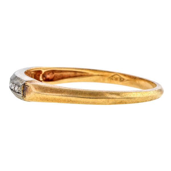 Vintage ring: a White And Yellow Gold Channel Set Single Cut Diamond Wedding Band sold by Doyle & Doyle vintage and antique jewelry boutique.