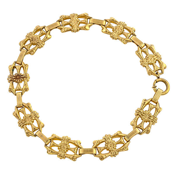 Vintage bracelets: a Yellow Gold Ornate Floral Motif Link Bracelet sold by Doyle & Doyle vintage and antique jewelry boutique.