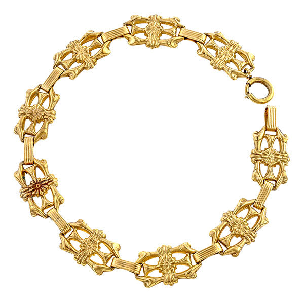 Vintage bracelets: a Yellow Gold Ornate Floral Motif Link Bracelet sold by Doyle & Doyle vintage and antique jewelry boutique.