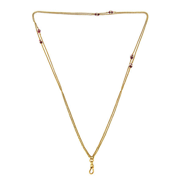 Vintage necklace: a Yellow Gold With Rock Crystal And Garnet Chain sold by Doyle & Doyle vintage and antique jewelry boutique.