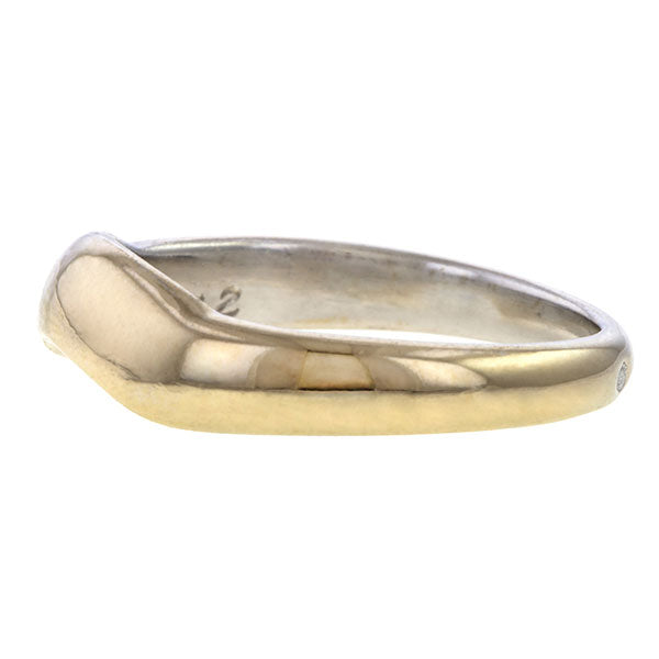 Vintage ring: a White Gold Curved Chanel Wedding Band sold by Doyle & Doyle vintage and antique jewelry boutique.