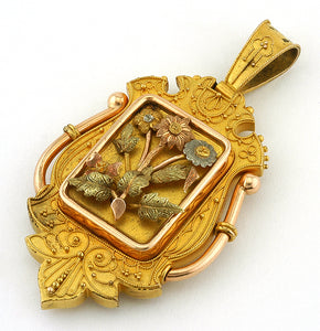Victorian Etruscan Revival Locket, sold by Doyle & Doyle an antique and vintage jewelry store.