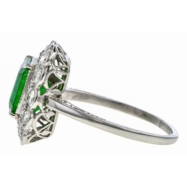 Vintage ring: a Platinum Emerald Cut Emerald Ring sold by Doyle & Doyle vintage and antique jewelry boutique.