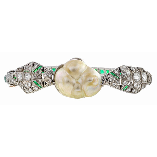 Art Deco bracelet: a Platinum Natural Pearl, Emerald And Diamond Bracelet sold by Doyle & Doyle vintage and antique jewelry boutique.