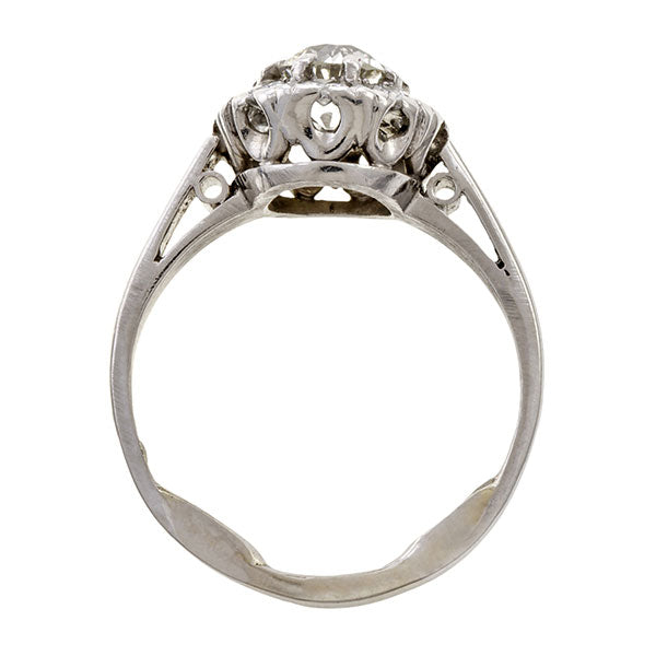 Vintage ring: a Platinum Diamond Cluster Old European Cut Engagement Ring sold by Doyle & Doyle vintage and antique jewelry boutique.