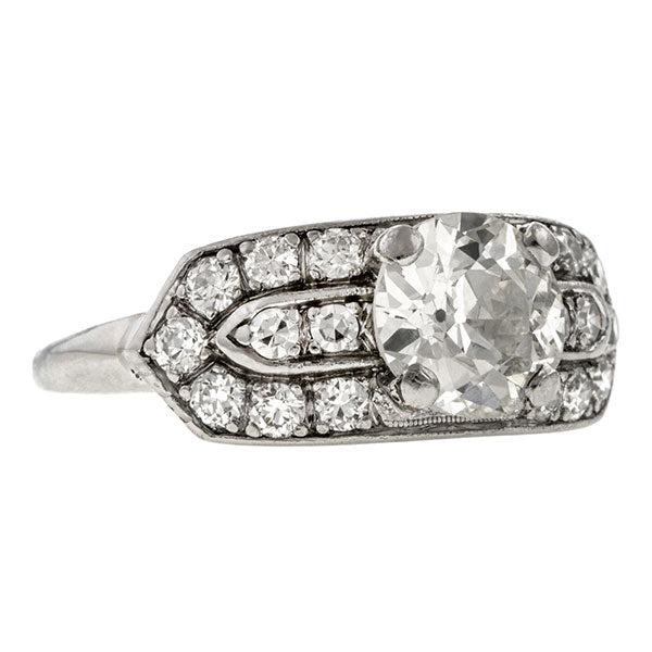 Art Deco ring: a Platinum Round Brilliant And Old European Cut Diamond Engagement Ring sold by Doyle & Doyle vintage and antique jewelry boutique.