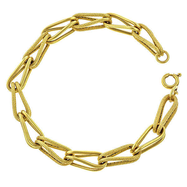 Vintage bracelet: a Yellow Gold Foldover Link Bracelet sold by Doyle & Doyle vintage and antique jewelry boutique.