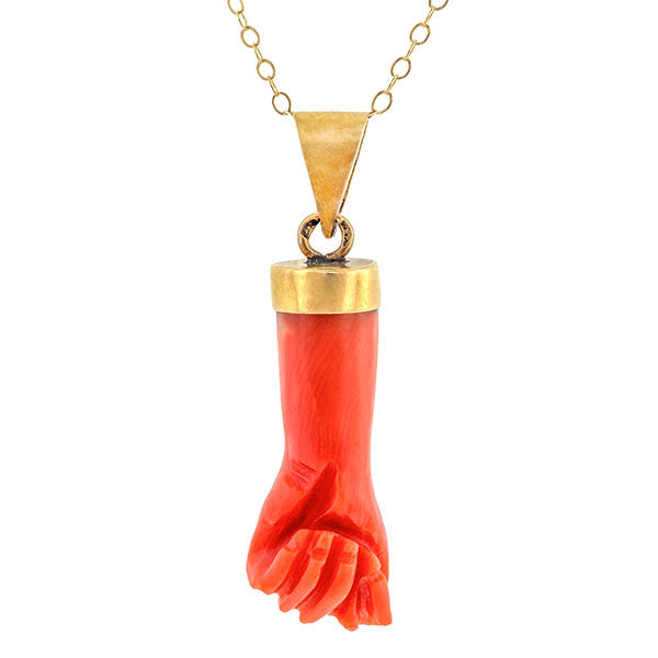 Vintage necklace: a Yellow Gold Coral Figa Hand Charm Pendant sold by Doyle & Doyle vintage and antique jewelry boutique. 