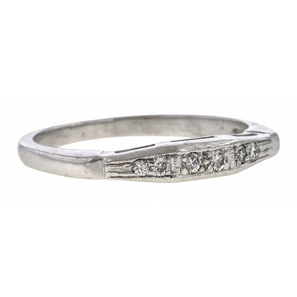 Vintage ring: a Platinum Round Brilliant Cut Diamond Wedding Band sold by Doyle & Doyle vintage and antique jewelry boutique.