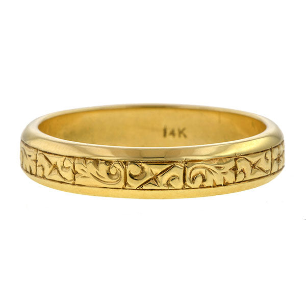 Vintage ring: a Yellow Gold Patterned Wedding Band sold by Doyle & Doyle vintage and antique jewelry boutique.