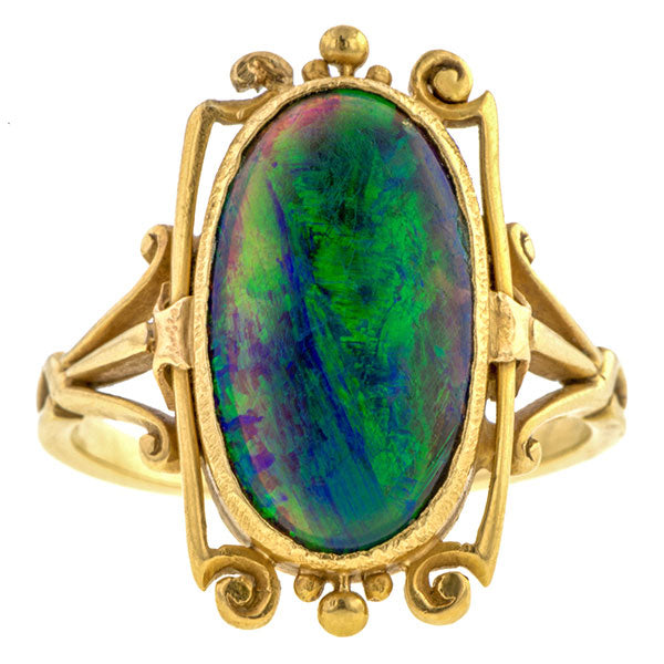 Art Nouveau ring: a Yellow Gold Black Opal Ring sold by Doyle & Doyle vintage and antique jewelry boutique.