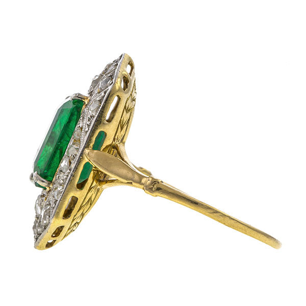 Antique ring: a Platinum Topped Yellow Gold Emerald & Diamond Ring sold by Doyle & Doyle vintage and antique jewelry boutique.