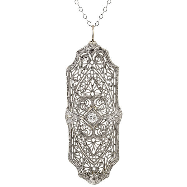 Vintage necklace: a Platinum Filigree Diamond Pendant sold by Doyle & Doyle vintage and antique jewelry boutique.