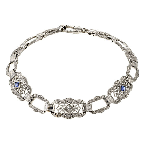 A Vintage Filigree Diamond and Sapphire Bracelet sold by Doyle & Doyle a antique and vintage jewelry boutique.