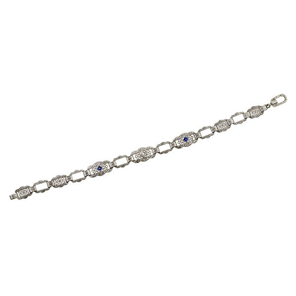 A Vintage Filigree Diamond and Sapphire Bracelet sold by Doyle & Doyle a antique and vintage jewelry boutique.
