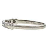 Vintage ring: a Diamond Wedding Band sold by Doyle & Doyle vintage and antique jewelry boutique.