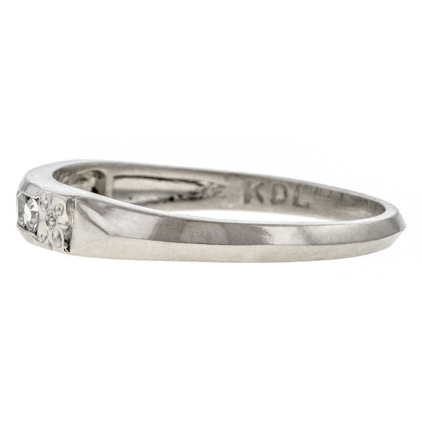 Vintage ring: a Platinum Diamond Wedding Band sold by Doyle & Doyle vintage and antique jewelry boutique.