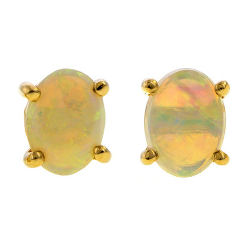 Oval Cabochon Opal Stud Earrings, sold by Doyle & Doyle an antique and estate jewelry boutique.