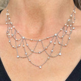 Vintage Diamond & Pearl Festoon Necklace sold by Doyle & Doyle an antique & vintage jewelry boutique.