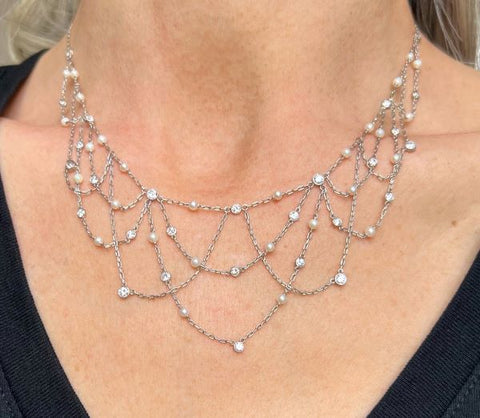 Vintage Diamond & Pearl Festoon Necklace sold by Doyle & Doyle an antique & vintage jewelry boutique.