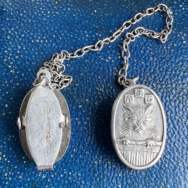 Antique ABC Cat Bib Clips sold by Doyle and Doyle an antique and vintage jewelry boutique