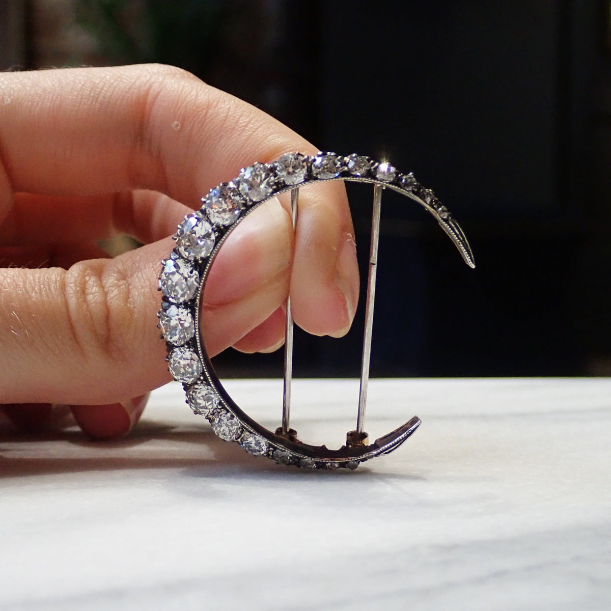 Antique Old European Crescent Brooch sold by Doyle and Doyle an antique and vintage jewelry boutique.