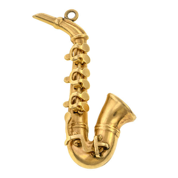 Antique Saxophone Charm Pendant sold by Doyle and Doyle an antique and vintage jewelry bourtique.