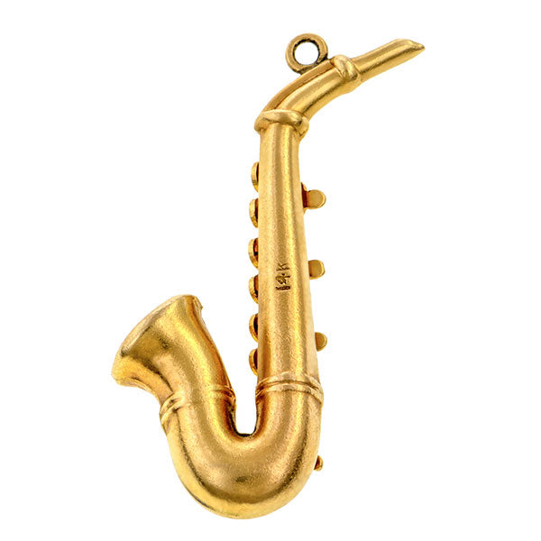 Antique Saxophone Charm Pendant sold by Doyle and Doyle an antique and vintage jewelry bourtique.