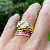 Vintage Gold Ruby & Diamond Snake Ring stacked with ruby and diamond eternity bands, sold by Doyle & Doyle antique and vintage jewelry boutique.