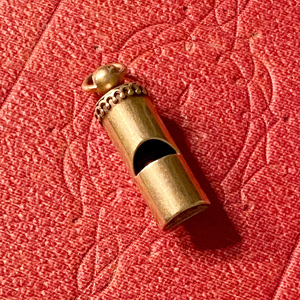 Vintage Whistle sold by Doyle and Doyle an antique and vintage jewelry boutique