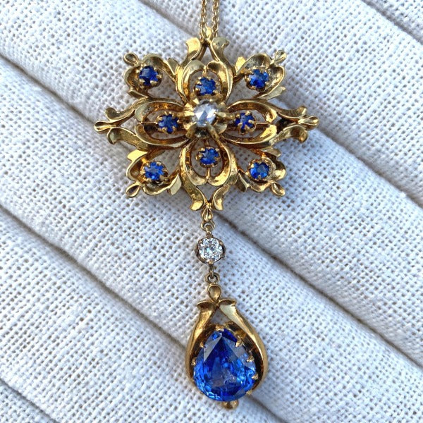 Antique Sapphire & Diamond Pendant Necklaces sold by Doyle & Doyle an antique and vintage jewelry boutique.