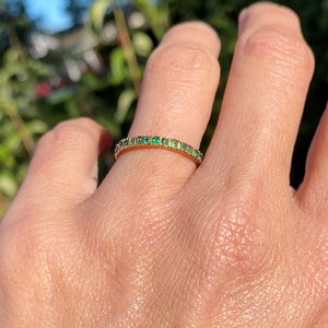 Vintage Emerald Eternity Band sold by Doyle and Doyle an antique and vintage jewelry boutique