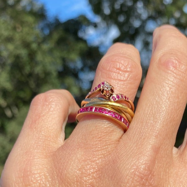 Vintage Ruby Eternity Wedding Band sold by Doyle & Doyle an antique and vintage jewelry boutique.