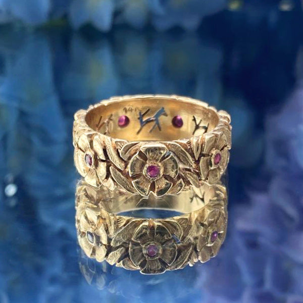 Vintage gold flower and ruby band ring from Doyle & Doyle