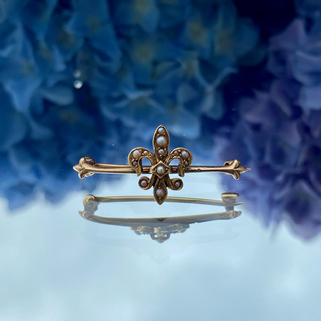 Antique Seed Pearl Fleur De Lis Pin sold by Doyle and Doyle an antique and vintage jewelry boutique.