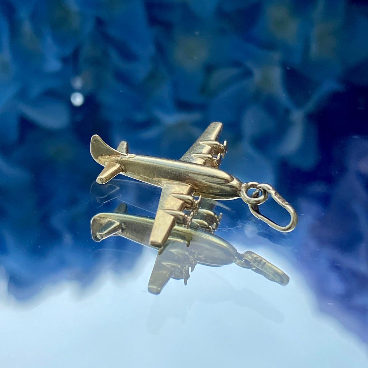 Vintage Airplane Charm Pendant sold by Doyle and Doyle an antique and vintage jewelry boutique.