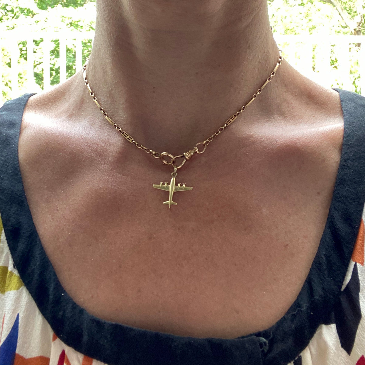 Vintage Airplane Charm Pendant sold by Doyle and Doyle an antique and vintage jewelry boutique.