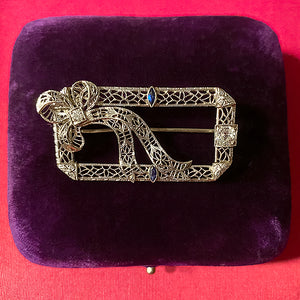 Vintage Diamond & Sapphire Filigree Pin sold by Doyle and Doyle an antique and vintage jewelry boutique