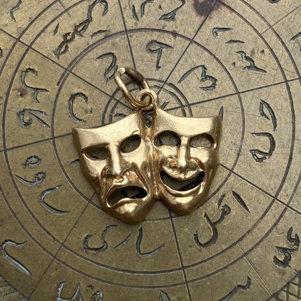 Vintage Comedy & Tragedy Mask Charm Pendant sold by Doyle & Doyle an antique and vintage jewelry boutique.